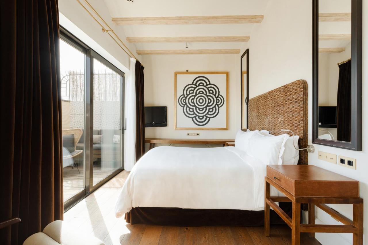 Do Placa Reial Powered By Sonder Барселона Екстериор снимка A bedroom at the hotel