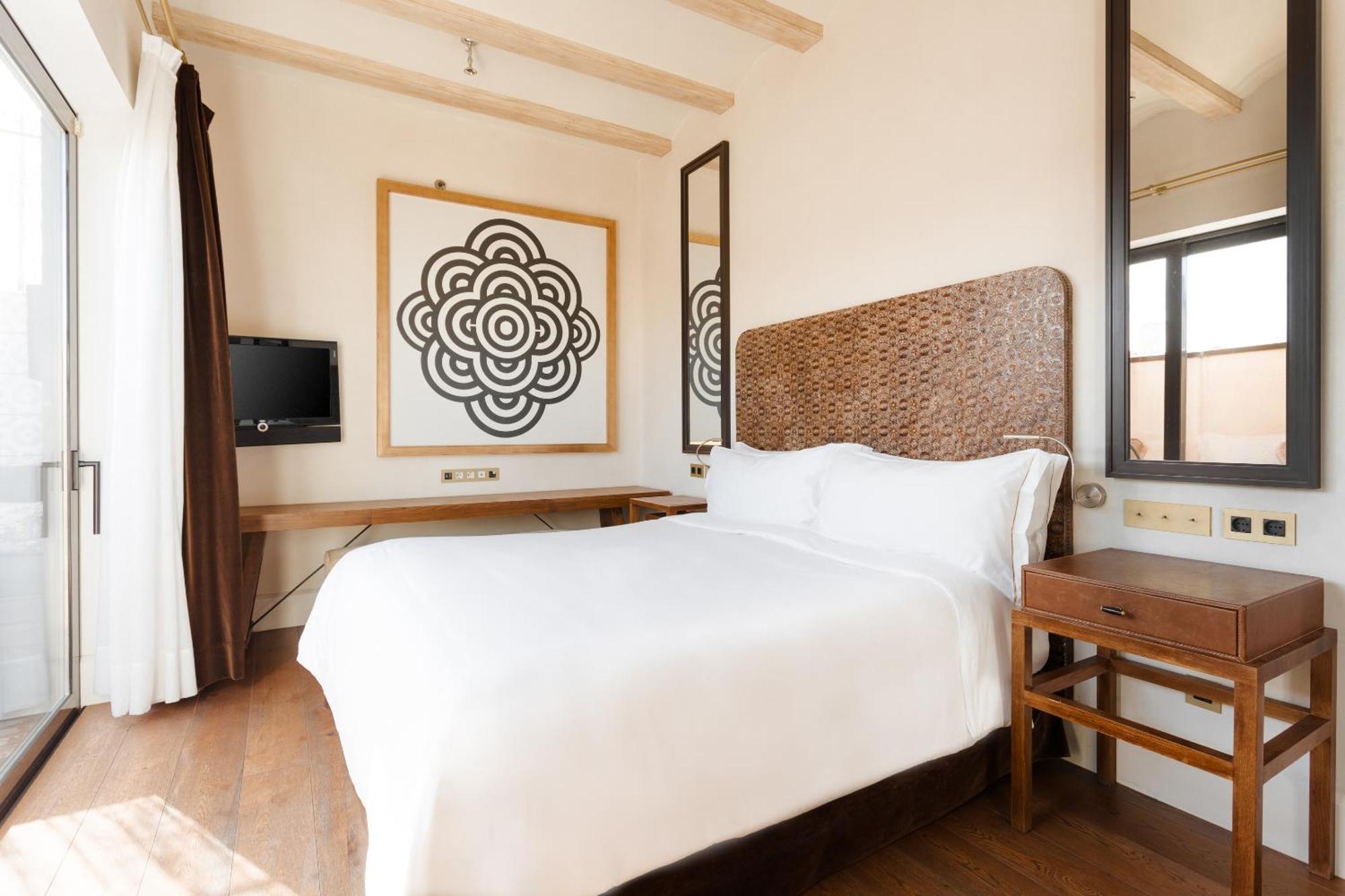 Do Placa Reial Powered By Sonder Барселона Стая снимка A bedroom at the hotel