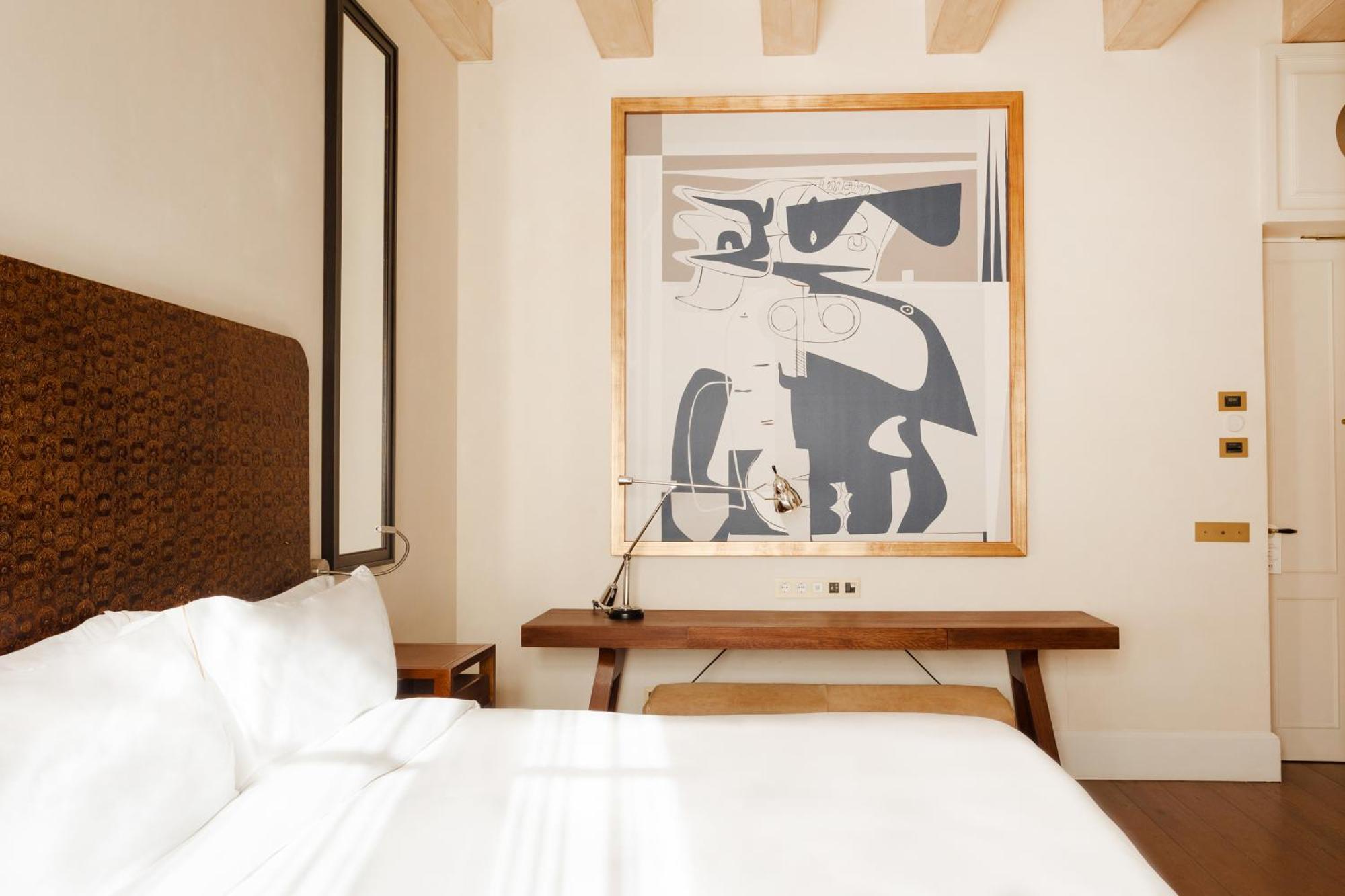 Do Placa Reial Powered By Sonder Барселона Стая снимка A bedroom at the Hotel Chaco